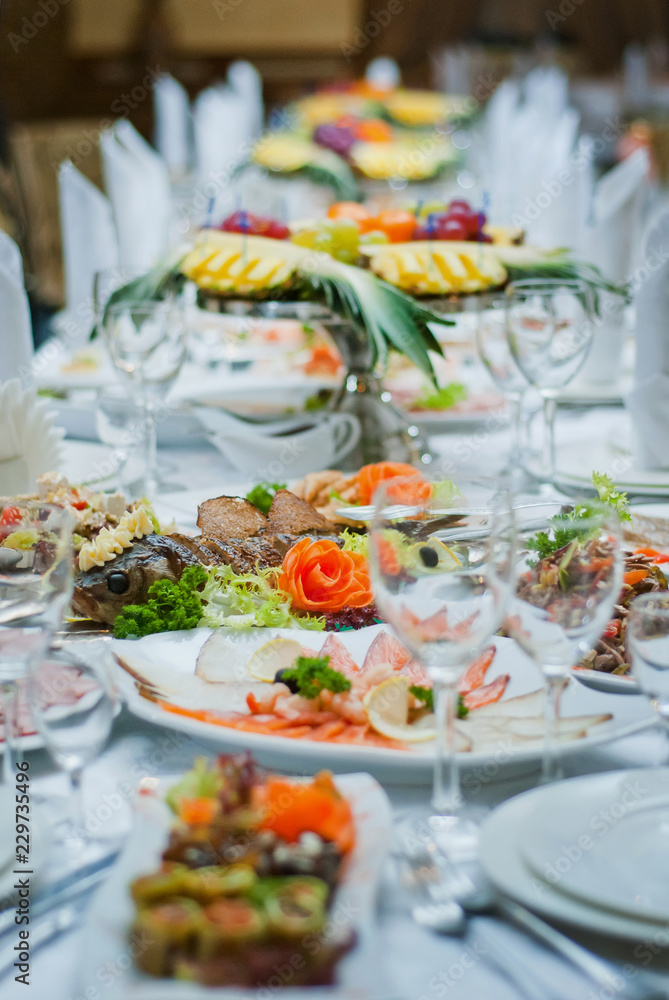 delicious dishes on the table in the restaurant. serving table.