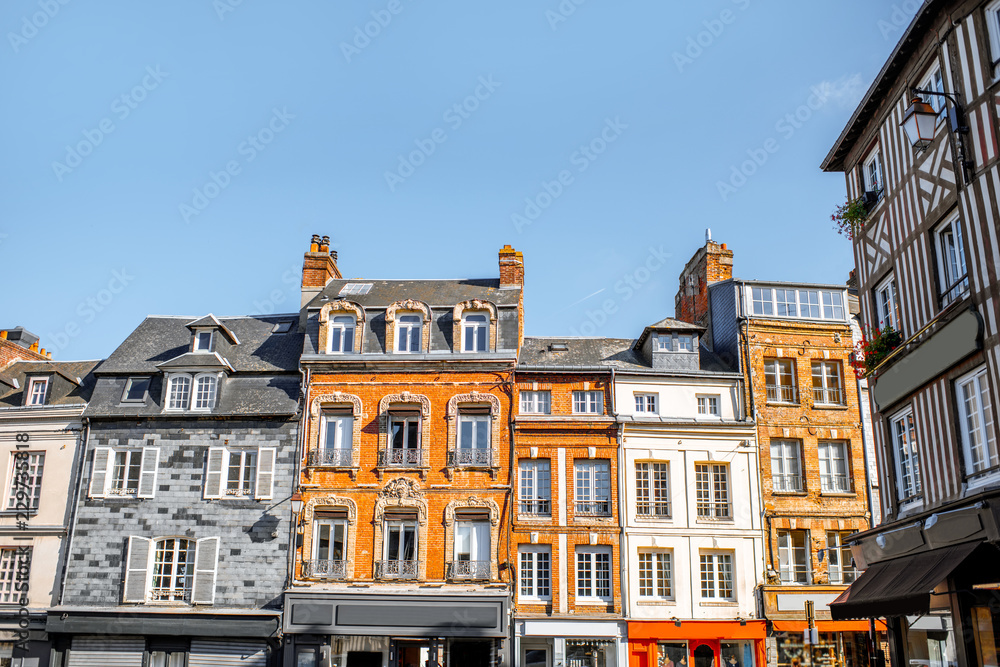 Fototapeta premium Beautiful facades of the old buildings in the central square in Honfleur, famous french town in Normandy