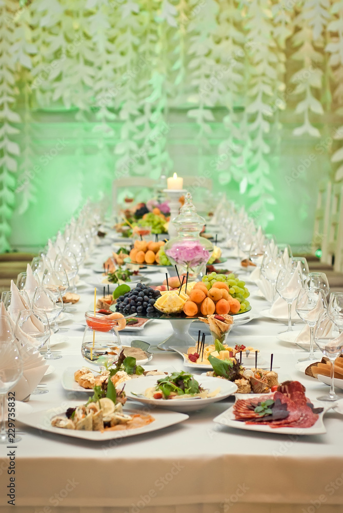 delicious dishes on the table in the restaurant. serving table. delicious dishes on the table in the restaurant. serving table.