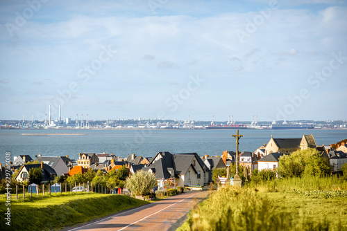 Fototapeta Naklejka Na Ścianę i Meble -  Landscape view on Villerville and ocean with La Havre port on the background in Normandy, France