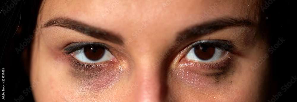 Naklejka premium mental health problem and domestic violence concept - eyes of unhappy crying woman