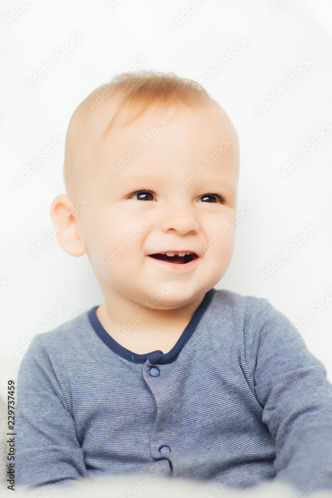 The concept of a happy childhood and safety. Portrait of a crawling baby. Good night. Children's clothing. Good morning. Son. The concept of a happy childhood and safety. Portrait of a crawling baby. Good night. Children's clothing. Good morning. Son.