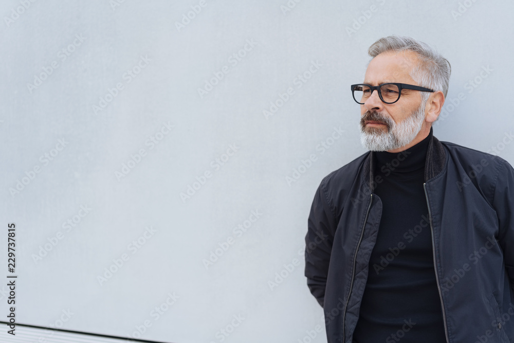 Handsome older bearded man standing waiting Handsome older bearded man standing waiting