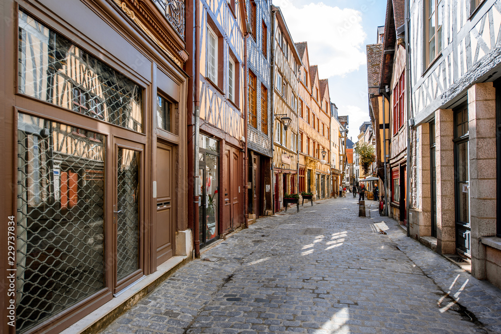 Street view with beautiful colorful half-timbered houses in Rouen city, the capital of Normandy region in France