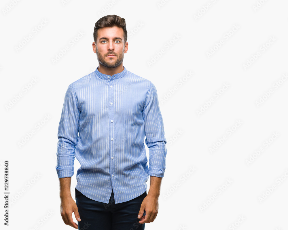 Young handsome man over isolated background with serious expression on face. Simple and natural looking at the camera. Young handsome man over isolated background with serious expression on face. Simple and natural looking at the camera.