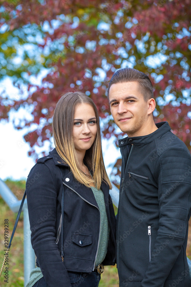 Funny couple laughing with a white perfect smile