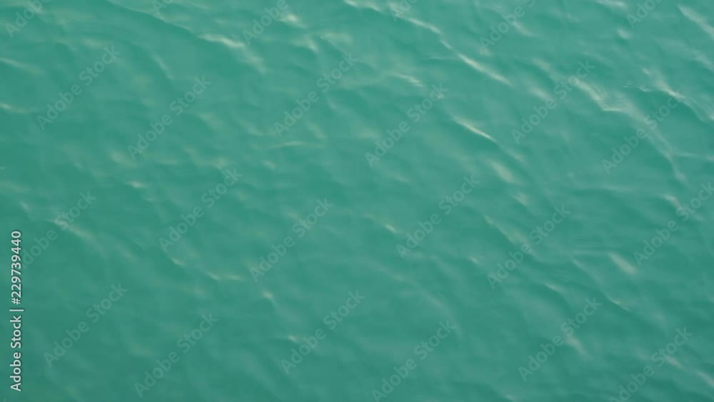 Top view of saltwater of calm sea. Beautiful marine water background. Real time 4k video footage. Top view of saltwater of calm sea. Beautiful marine water background. Real time 4k video footage.