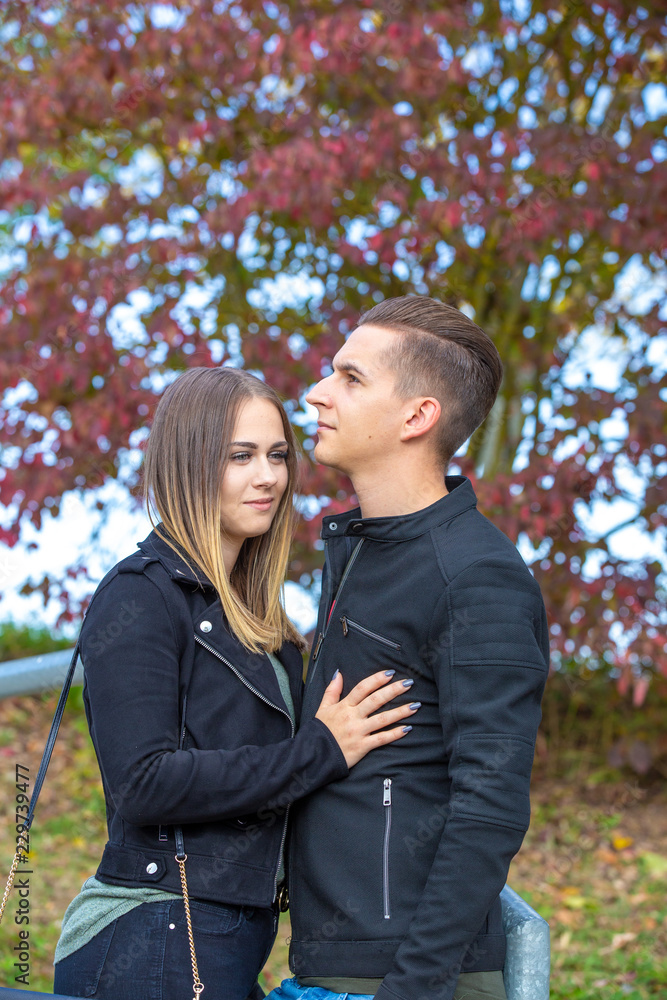 Funny couple laughing with a white perfect smile