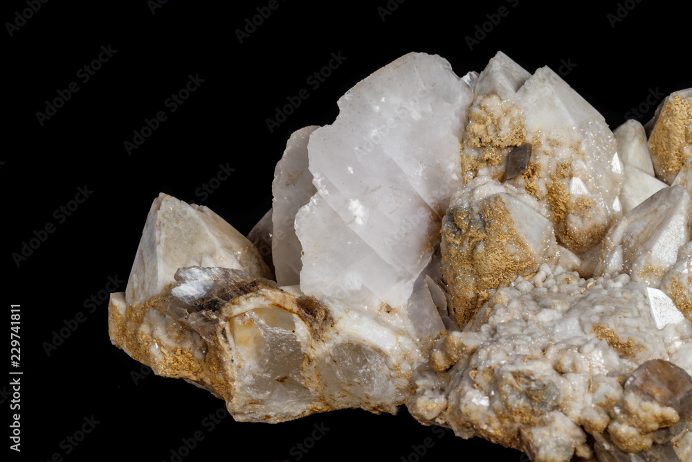 Macro mineral stone Snow quartz with calcite on a black background Macro mineral stone Snow quartz with calcite on a black background