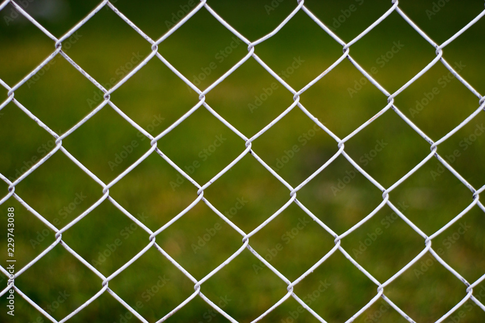 Steel wire mesh fence as texture background Steel wire mesh fence as texture background