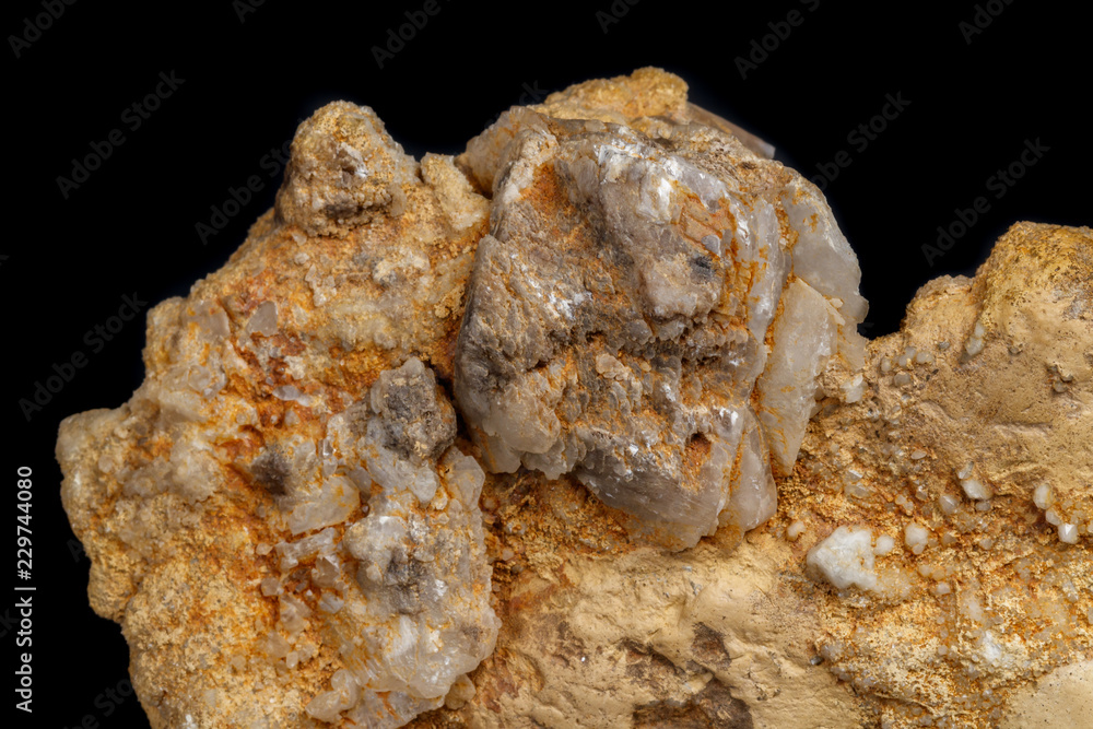Macro mineral stone Snow quartz with calcite on a black background Macro mineral stone Snow quartz with calcite on a black background