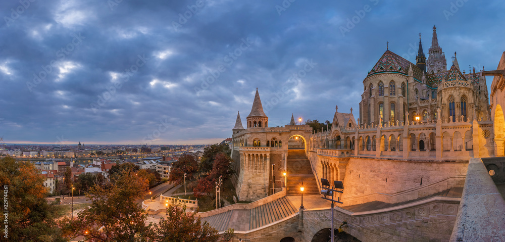 Budapest, Hungary - Panoramic view of the famous Fisherman's Bastion (Halaszbastya) with the Matthias Church (Matyas templom) in the morning with cloudy sky at autumn