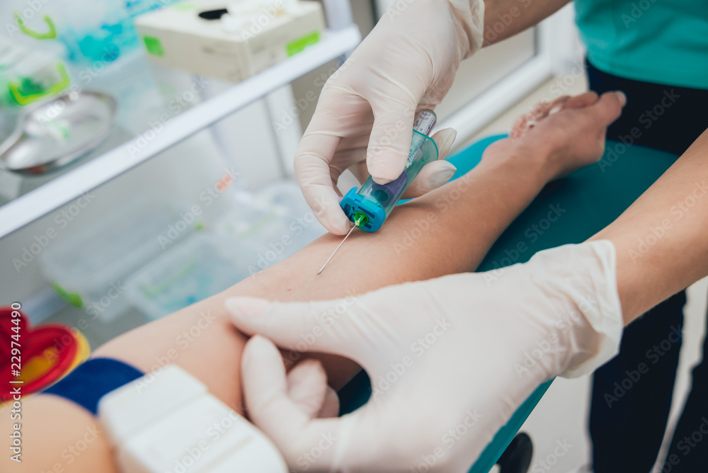 Nurse taking a little child blood sample. Medical equipment. Nurse taking a little child blood sample. Medical equipment.