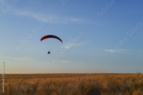  paraglider flying in the sky