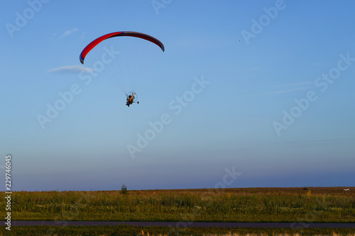  paraglider flying in the sky