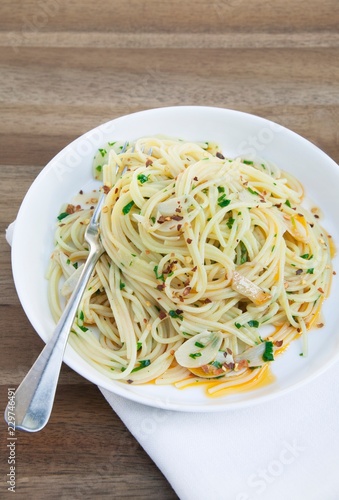 Spaghettini aglio olio (spaghetti with garlic and olive oil) photo