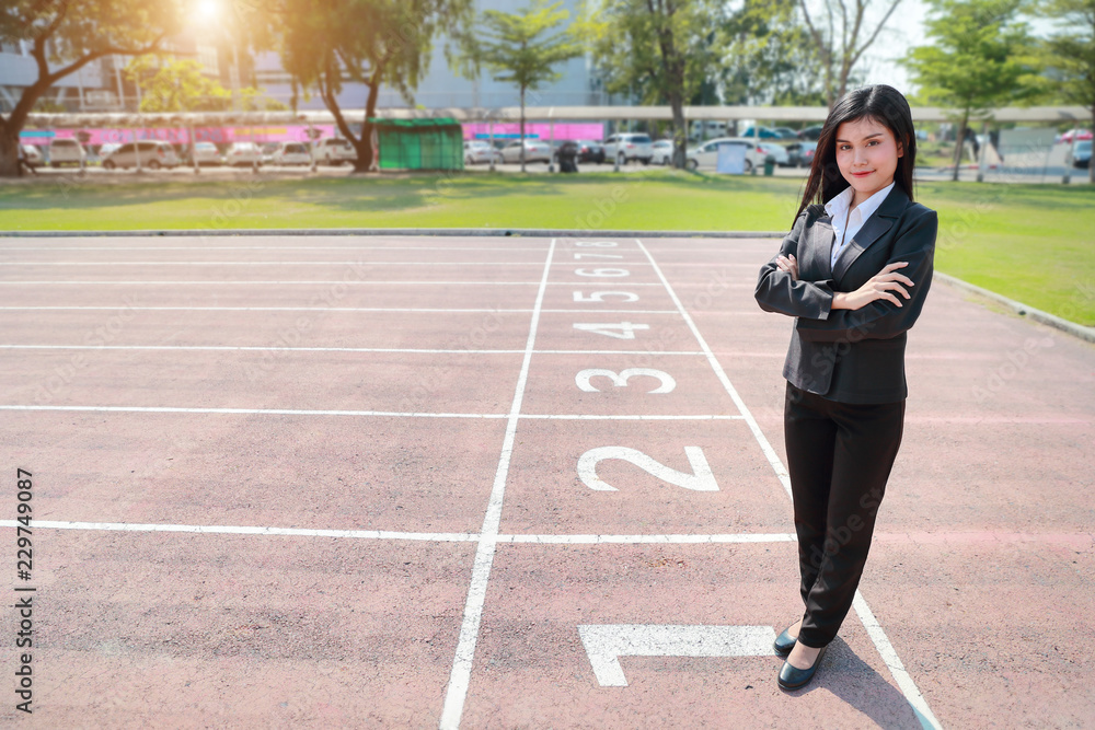 Business competition: businesswoman is the winner on number 1 at start line