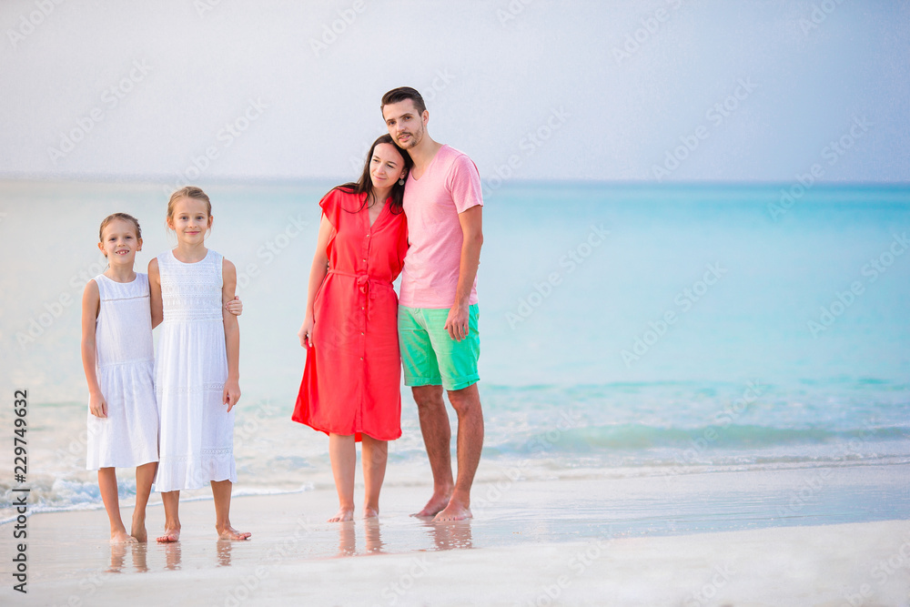 Young family on vacation on caribbean beach Young family on vacation on caribbean beach