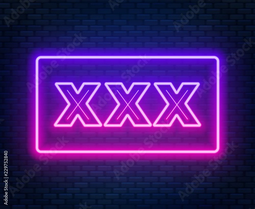 XXX neon sign on a dark background.