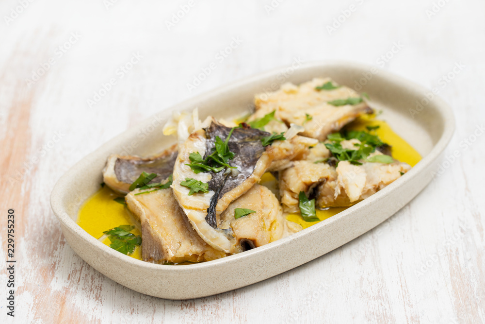 boiled cod fish with herbs and olive oil boiled cod fish with herbs and olive oil