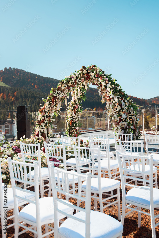 Autumn wedding decoration in the mountains. Modern wedding