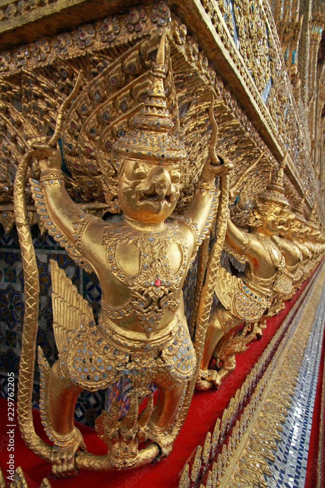 Statue and external decoration in Wat Phra Kaew temple complex, Royal Palace, Bangkok, Thailand