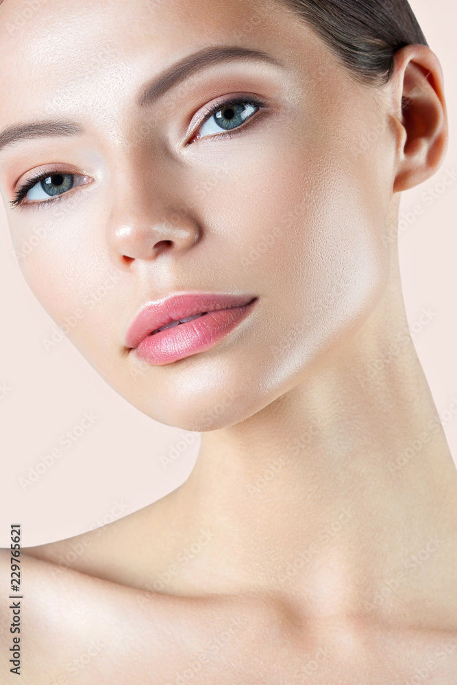 Fototapeta premium Young beautiful woman with clean perfect skin close-up
