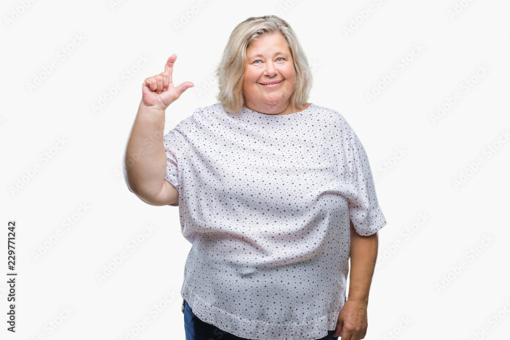 Senior plus size caucasian woman over isolated background smiling and confident gesturing with hand doing size sign with fingers while looking and the camera. Measure concept. Senior plus size caucasian woman over isolated background smiling and confident gesturing with hand doing size sign with fingers while looking and the camera. Measure concept.