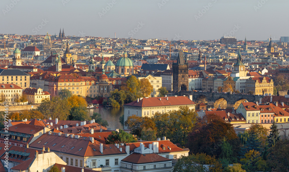 Prague - The panorama of the city with the Charles bridge on Olt Town in evening light.