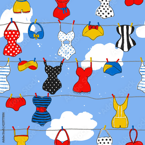 Trendy vector seamless pattern with cute swimsuits