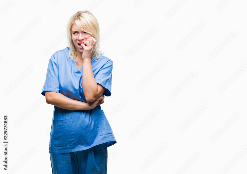 Young beautiful blonde nurse doctor woman over isolated background looking stressed and nervous with hands on mouth biting nails. Anxiety problem. Young beautiful blonde nurse doctor woman over isolated background looking stressed and nervous with hands on mouth biting nails. Anxiety problem.
