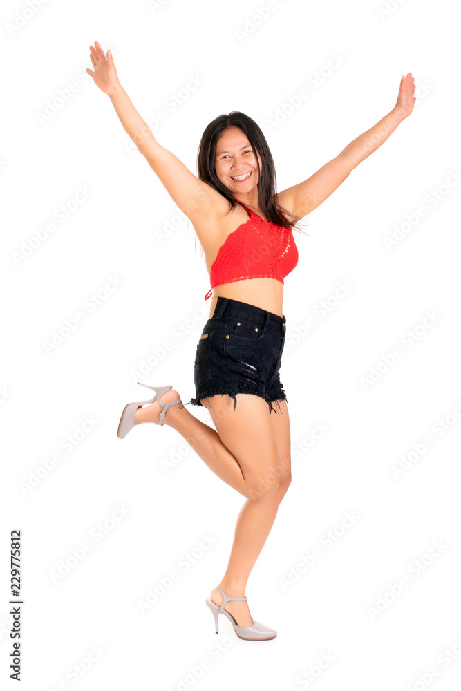Smiling joyful woman dancing and celebrating Smiling joyful woman dancing and celebrating
