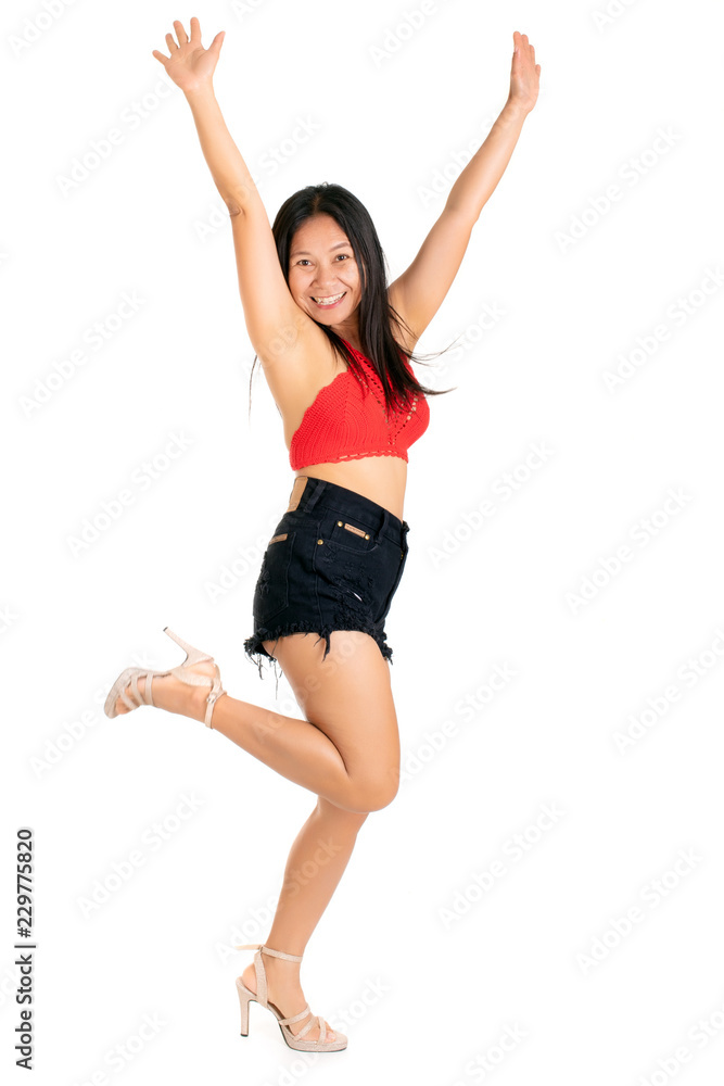 laughing dancing young woman in a trendy outfit laughing dancing young woman in a trendy outfit