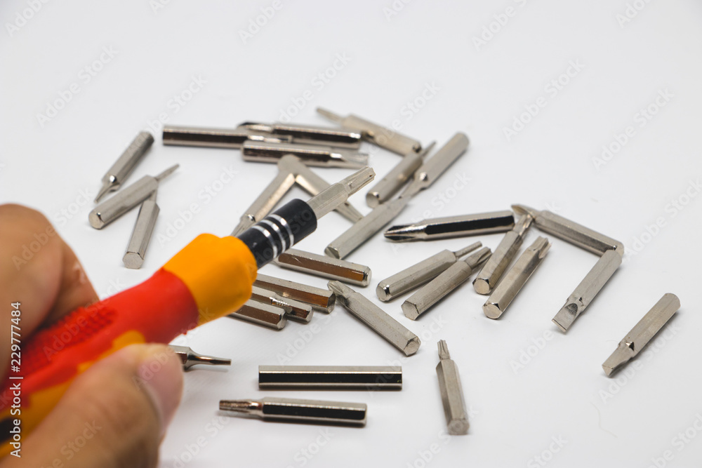 Screwdriver tips in a white background.  The screwdriver bit set in tools.
