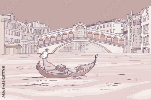 Foto Venetian gondola with gondolier near Realto bridge.