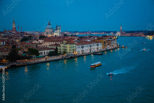 Night view of Grand Canal with old houses in Venice in Italy