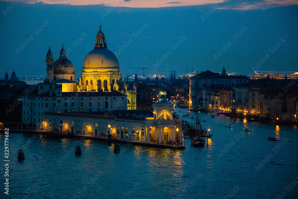 Night view of Grand Canal and basilica di santa maria della salute in Venice in Italy