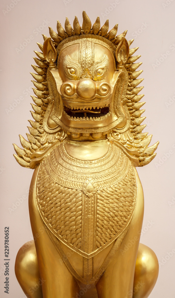 Fototapeta premium Golden lion statue in the thai temple