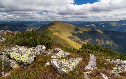 nature landscape in rodnei mountains on a beautiful cloudy autumn day photo