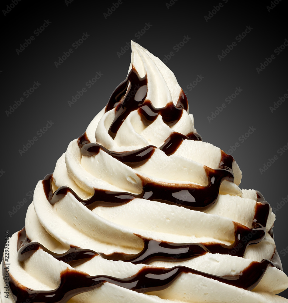 Whipped cream, frozen yogurt or soft ice cream with chocolate sauce