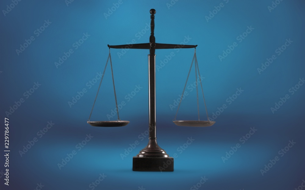 Law scales on table background. Symbol of Law scales on table background. Symbol of
