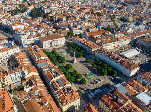 The aerial view on Pedro IV Square with the same named Column and The National Theatre of Lisbon, Portugal.