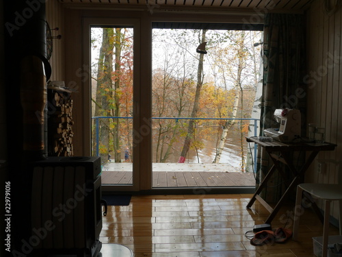View from the window on the autumn landscape, home interior