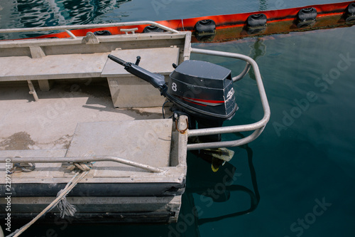 Boat motor black motors installed on the yacht © Vivid Cafe