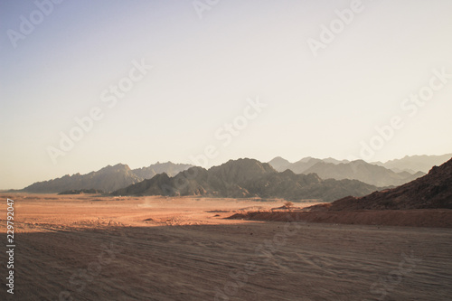 Desert in Egypt. Sharm el Sheikh. Sand and Sand Borkhan. Rock and sunset.