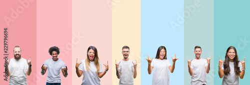 Collage of different ethnics young people wearing white t-shirt over colorful isolated background shouting with crazy expression doing rock symbol with hands up. Music star. Heavy concept.
