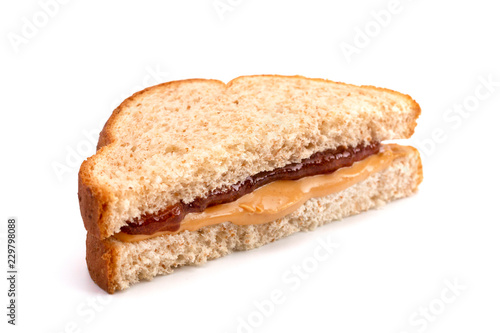 A Classic Peanut Butter and Strawberry Jelly Sandwich on Wheat Bread