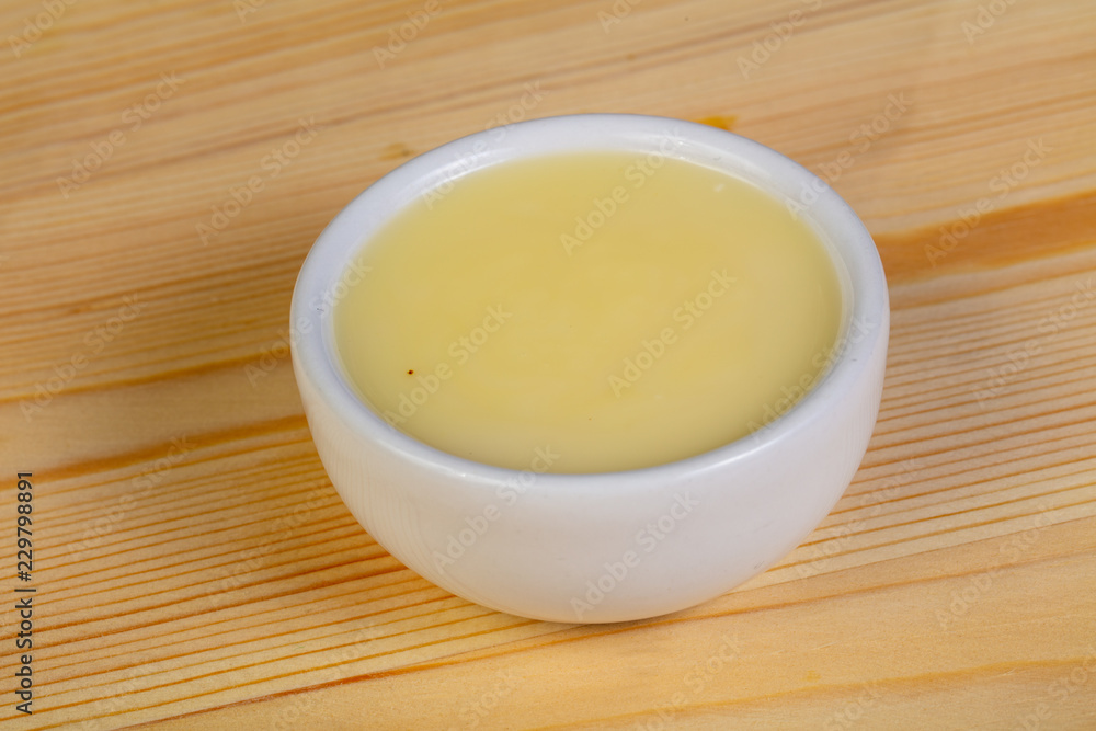 Condensed milk in the bowl Condensed milk in the bowl