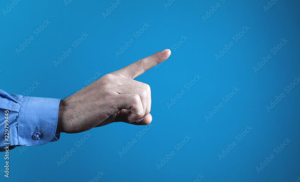 Businessman hand pointing gesture. Business concept