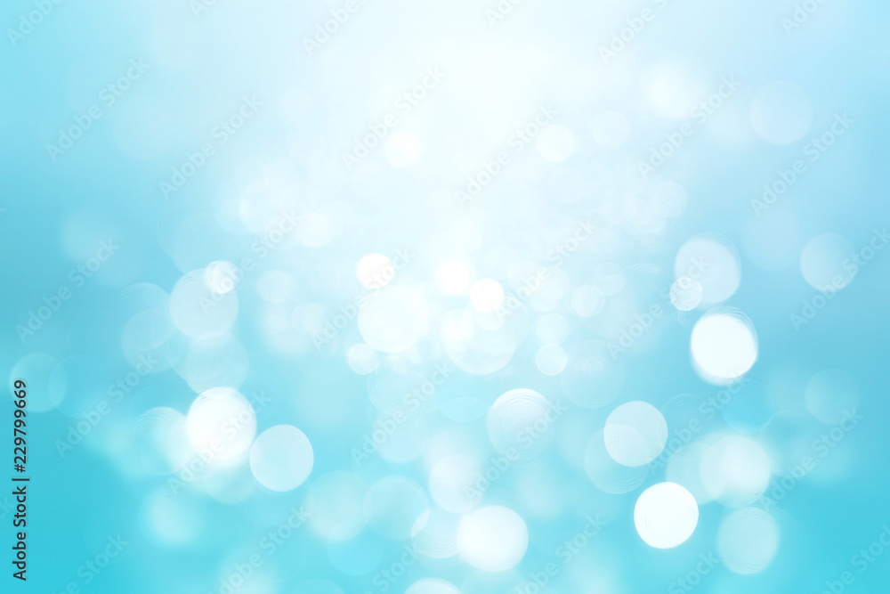 Abstract colorful blur blue texture background with white and blue bokeh circles in soft color style. Template for underwater backdrop or winter design illustration.